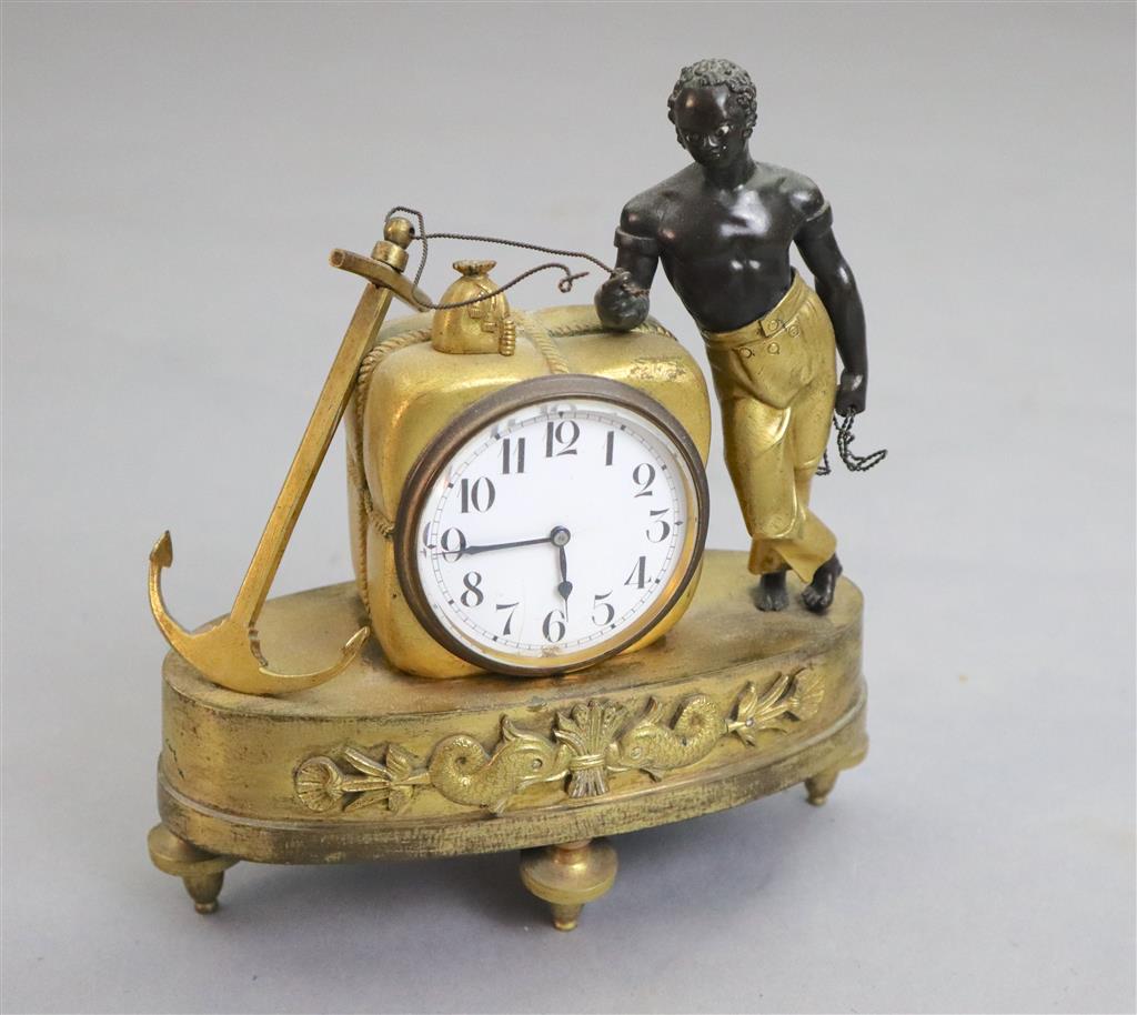 A 19th century French Empire bronze and ormolu mantel timepiece, width 6.5in. height 7.25in.